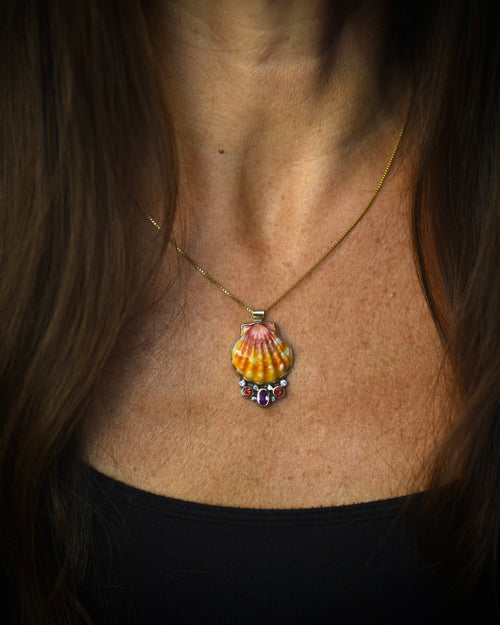 Hawaiian sunrise shell and gemstone pendant necklace worn on an 18-inch gold-filled box chain

