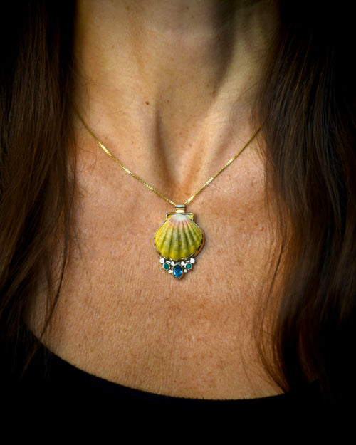 Hawaiian sunrise shell and gemstone pendant necklace worn on an 18-inch gold-filled box chain