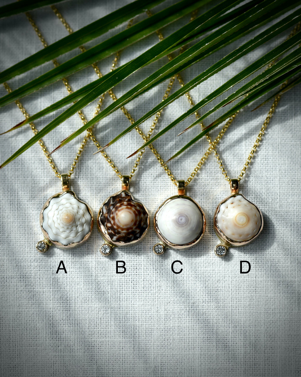 Petite Puka Dot necklace options A through D displayed side by side for comparison
