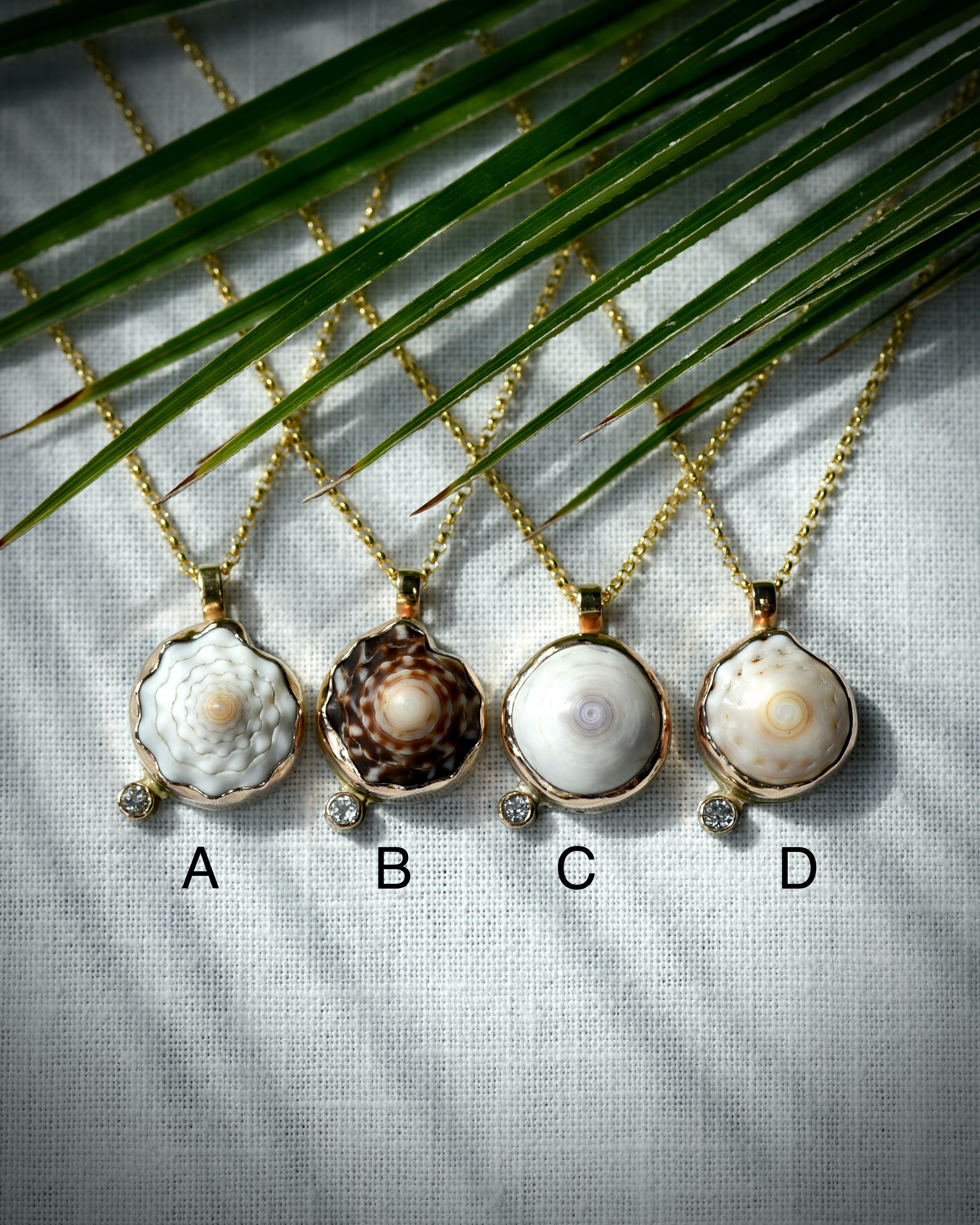 Petite Puka Dot necklace options A through D displayed side by side for comparison
